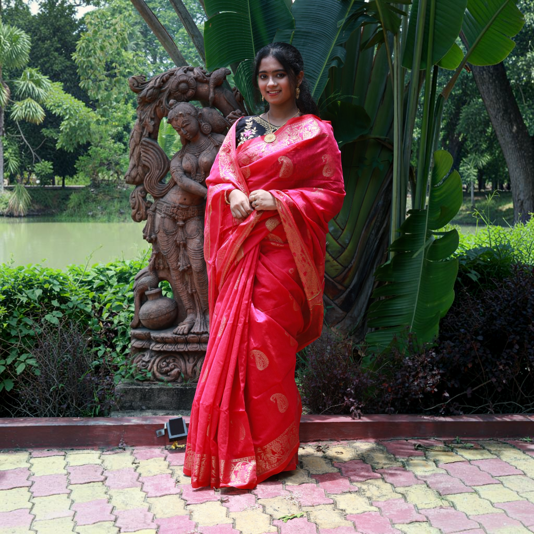Bright Pink with Golden zari work.